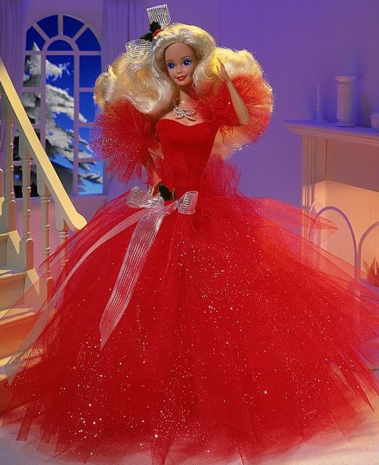 1980s Barbie in a fluffy red gown with big blonde hair and bows